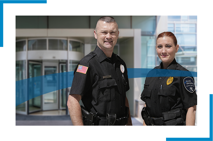 Two security officers in black uniform