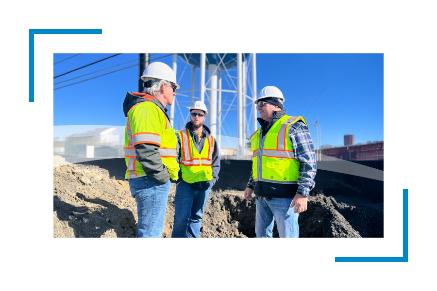 people standing in the construction site