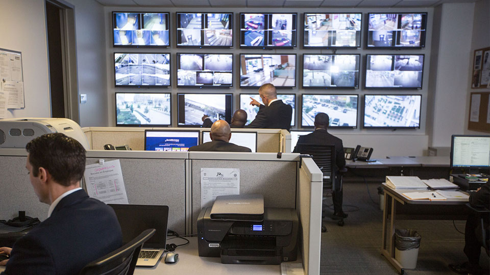 security professionals monitoring video surveillance 